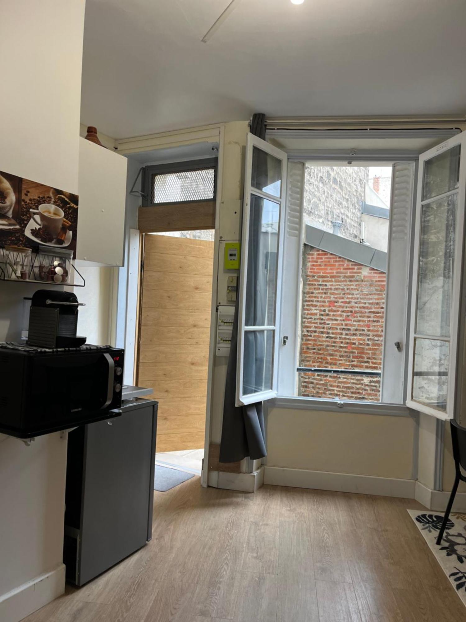 Charmant Studio Spacieux ปารีส ภายนอก รูปภาพ
